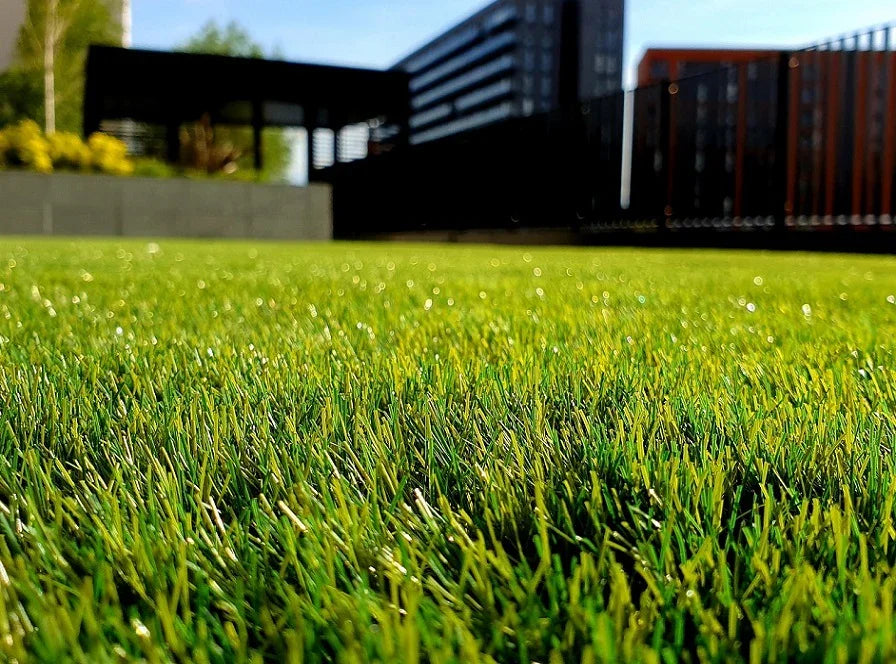 Why is drainage important in artificial turf?