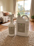 smellBgone PLUS+ 750ml bottle beside a 5L container