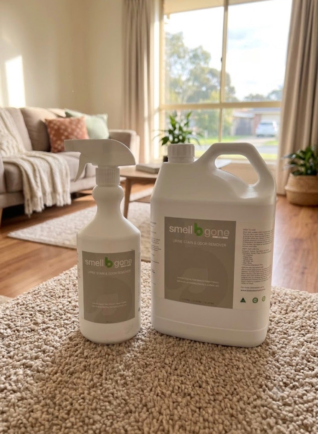 smellBgone PLUS+ 750ml bottle beside a 5L container